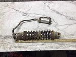 82 Suzuki Rear Back Shock Spring Assembly. Fixed Price $135.00.