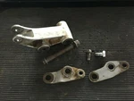 1987 Kawasaki KX125 Rear Suspension Linkage Arm Body And Brackets 39007-1115. Fixed Price $30.00.