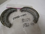 Suzuki PE175 Nos Front Brake Shoe Set 1982-1984 54400-14850. Fixed Price $19.79.