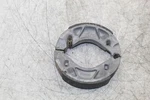 03-11 Yamaha Zuma 50 Brake Shoe Set 5DV-W253E-02-00. Fixed Price $20.00.