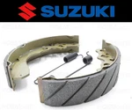 Set Of (2) Suzuki Water Grooved Front Brake Shoes And Springs #54400-19810. Fixed Price $39.74.