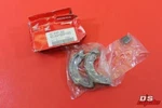 Nos Honda Aero 50 Elite Brake Shoe Set Part# 431A2-GE8-003. Fixed Price $19.95.