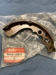 New Geniune Suzuki 54400-19810 Shoe, Brake Kit. Fixed Price $28.43.