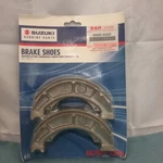 New Genuine Suzuki 64400-05820 Shoe Set, Brake 2004-2009. Fixed Price $64.26.