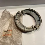 Nos Yamaha Brake Shoe Kit Set 214-W2535-00-00 Oem. Fixed Price $75.00.