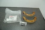 New Genuine Yamaha 5FU-WF536-00 Brake Shoe Set Springs Grizzly Big Bear Kodiak. Fixed Price $150.00.