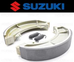 Set Of (2) Suzuki Front Brake Shoes And Springs #54410-11000 (see Fitment Chart). Fixed Price $76.49.