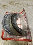 Nos Suzuki Brake Shoe 64410-40200. Fixed Price $20.00.