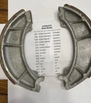 Nos New Kawasaki KZ400 KH250 A1, S1, A7, S2, Brake Shoe Set #41048-019. Fixed Price $27.00.