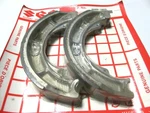 Nos Suzuki Atv LTF250 LTF4WD Brake Shoes 64400-19820. Fixed Price $20.40.