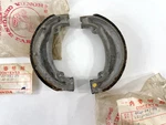 Nos 83 Honda CR125 Front Brake Shoe Set 45120-KA3-711. Fixed Price $24.95.