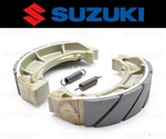 Set Of (2) Suzuki Water Grooved Front Brake Shoes And Springs #54400-02810. Fixed Price $32.24.