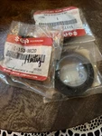 Suzuki Front Fork Dust Seal ((2) #51173-08C20) Oil Part #51153-08C20. Fixed Price $50.00.